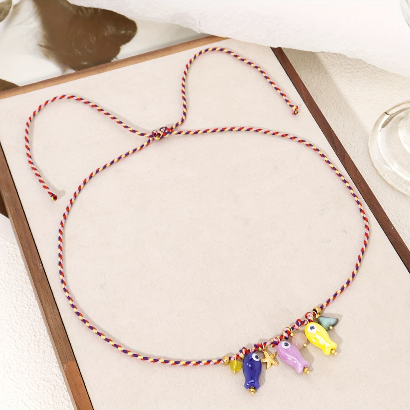 TEMU A Stylish Women's Necklace Featuring A Delicate Irregular Stone Ceramic Cartoon Fish Pendant, With A Colorful Adjustable Braided Cord, Perfect For Party And Vacation Jewelry Additions