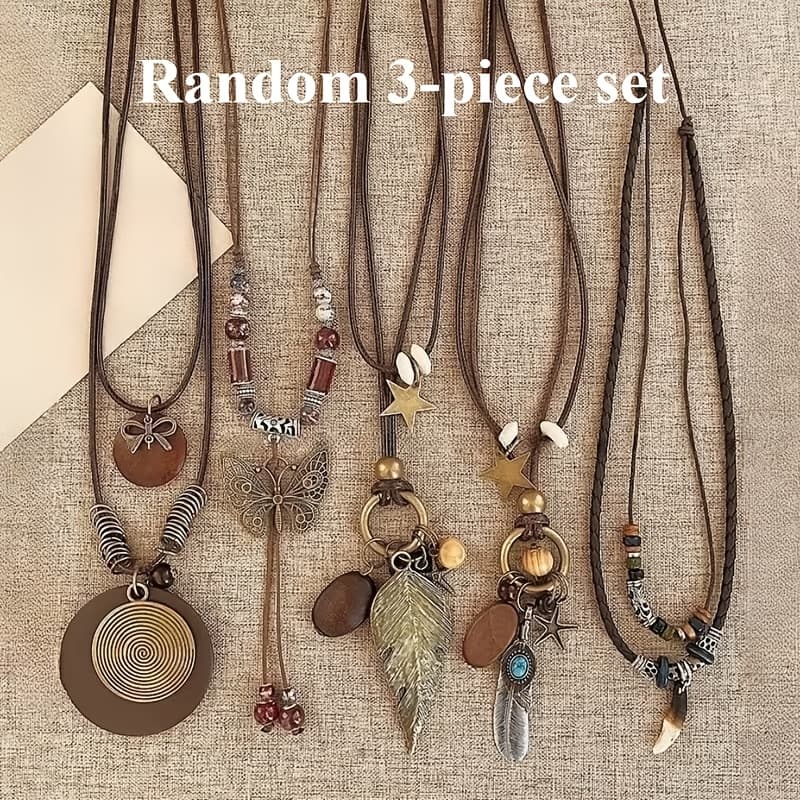 TEMU A Collection Of 3 Long Pendant Necklaces In A Bohemian Vintage Style, Showcasing Geometric Designs Of Feathers And Leaves. Use, Formal Events, And As Gifts. Styles Are At Random