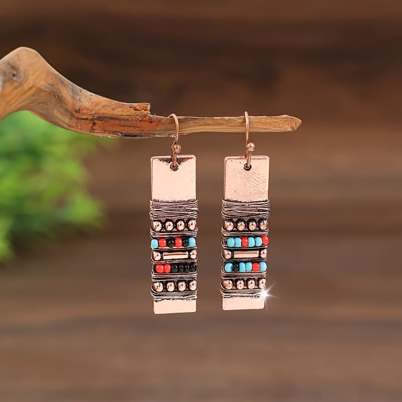 TEMU A Pair Of Handcrafted Beaded Resin And Alloy Earrings With A Twisted Design.