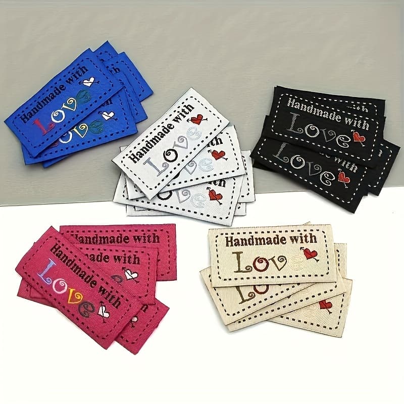 TEMU 50pcs Random Color Universal Clothing Weaving Labels, Fabric Labels, Heart-shaped Handmade Clothing Accessories, Handmade Label Splicing Labels, Knitted Products, Diy Wallet Making