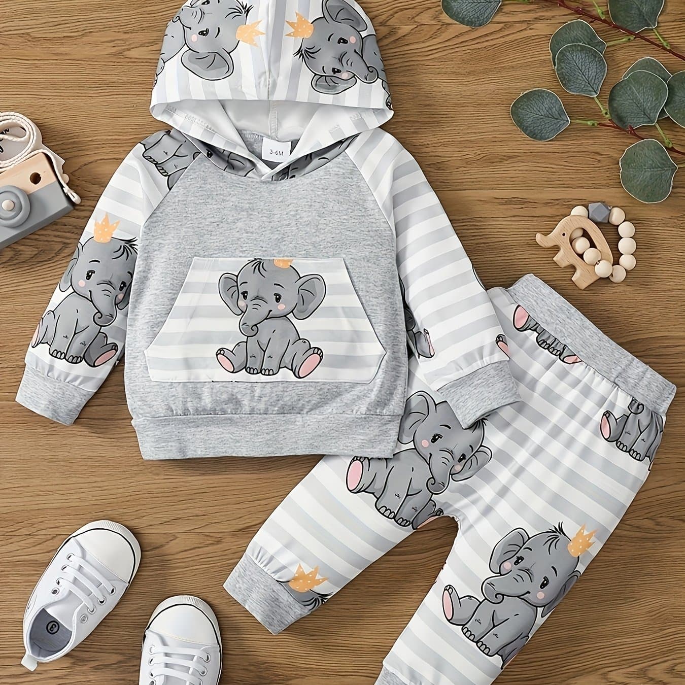 TEMU This Is A Two-piece Set For Baby Boys Featuring A Comfortable Long-sleeved Hooded Top With An Elephant Cartoon Print And Spliced Striped Long Pants With A Full Elephant Print, For Outdoor