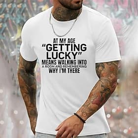 Humorous Men's Graphic T-Shirt featuring 'At My Age Getting Lucky Means Remembering Why I'm There' Quote, Funny Aging Lifestyle Short Sleeve