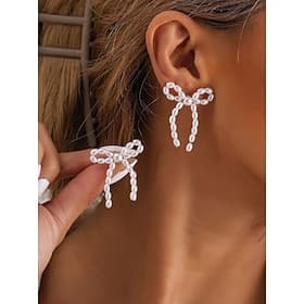 Elegant Pearl Bow Earrings with Delicate Design  Perfect for Everyday Wear and Special Occasions