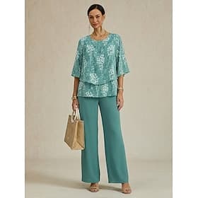 Ensemble pantalon fleuri en mousseline à manches courtes et col rond pour femme, idéal pour les mariages et les occasions élégantes.