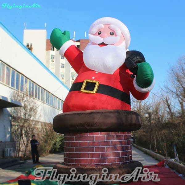 Outdoor Inflatable Christmas Santa Claus Carrying A Gift Bag Climbing Out From The Chimney For Christmas Decoration