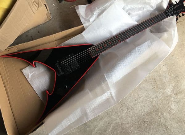 Custom factory direct sale black V-shaped electric guitar with tremolo, rosewood fingerboard, with 24 characters,