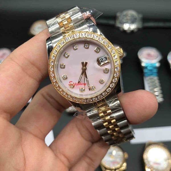 Chic Women's Stainless Steel Dress Watch Featuring a Shiny Shell Dial & Sleek Diamond Accents Perfectly Suited for Any Occasion 31mm