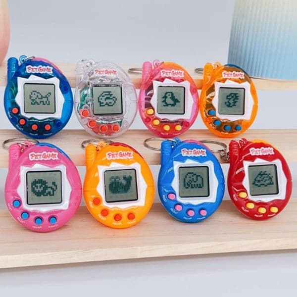 New Electronic Funny Mini Pet Game Console Electronic Pets Toys Keychain Multiple Color Available