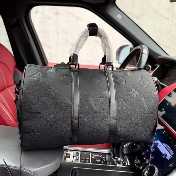 2026 5A ravelling bag compact portable designer bag men or women printed travel bag classic embossed old flower crossbody bag canvas shoulder strap bag shopping bag
