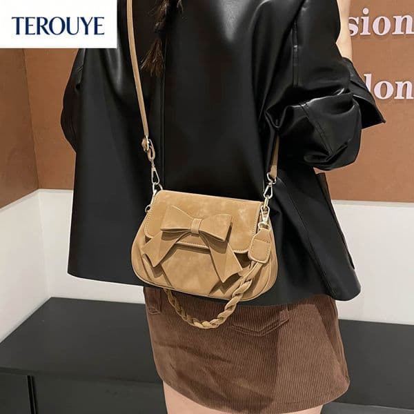 TEROUYE charming Retro bow casual women's armpit bag bag autumn and winter new bag fashion trend shoulder bag suede design retro luxury