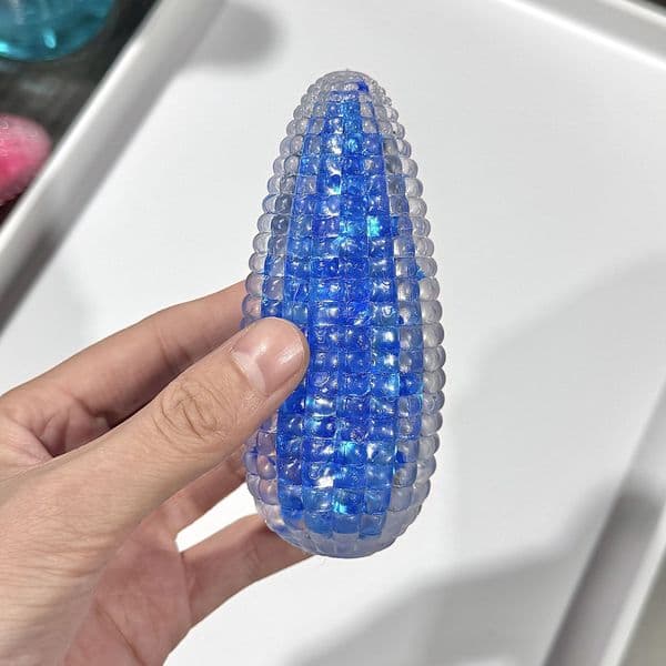 2026 New Pinch Music Glass Crystal Corn Pinch Music Release Ball Corn Plastic Rebound Stress Relieving Toy Relieve Flowing Sand