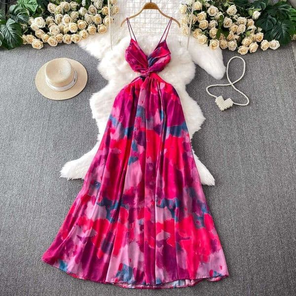 Seaside vacation style beach skirt with feminine design featuring cross twisted a16 details, waist and shoulder straps, and a large hem