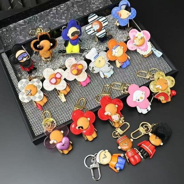 Designer Sunflower Doll Bag Charms Luxury Keychain Classic Leather Accessory Keyrings For Women Mans Lanyard Key Chain Purse Charm Cute Gifts