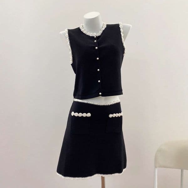 New design for spring and summer of j29 2026, featuring French aurora style with floral crochet vest and contrasting A-line short skirt
