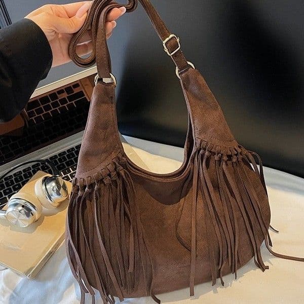 2026 new American niche Bohemian tassel handbag, new suede bucket shaped bag, multifunctional shoulder bag and crossbody bag