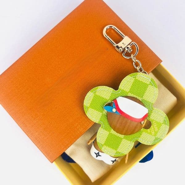 KeKeychains Lanyards Designer Bag Charm Cartoon Sunflower Letter Key Ring Canvas Bag Chain Luxury Keychain Lanyards