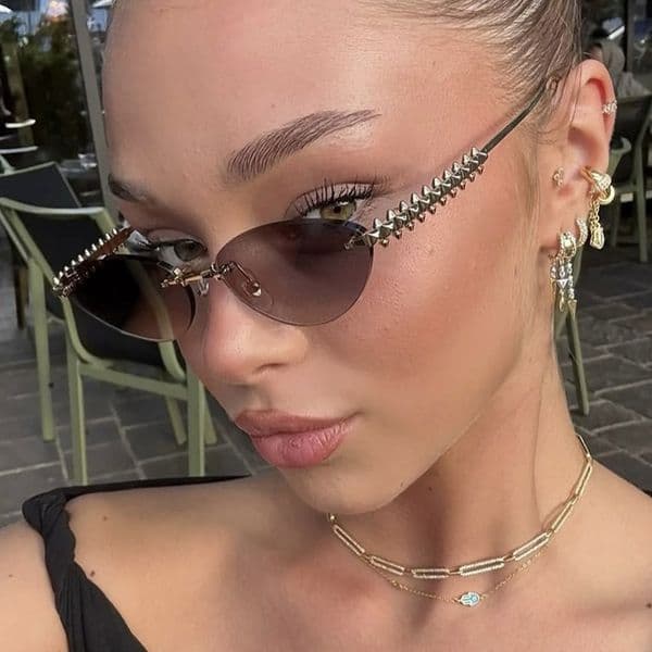Luxury Brand Designer Rivet Triangle Cat-eye Sunglasses Without Frame And With Beveled Edges. Fashionable, High-end Style Sunglasses With Sun Protection.