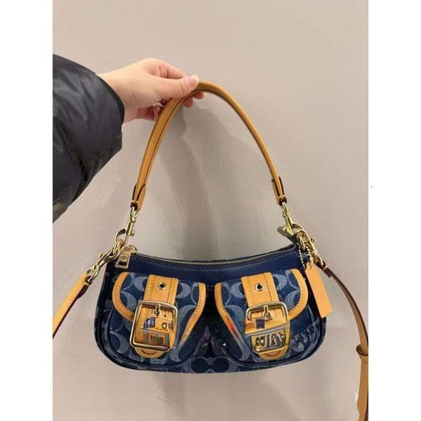 Designer Light luxury French stick bag 2026 new underarm bag, single shoulder crossbody bag, fashionable contrasting color motorcycle bag