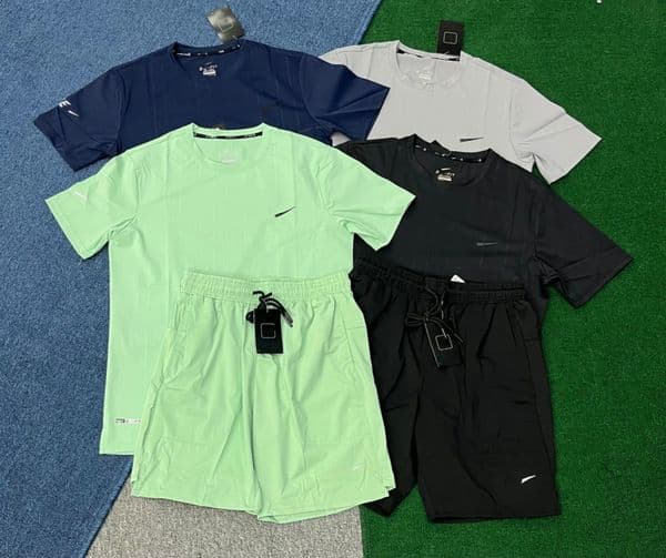 summer mens tracksuits tech set designer tracksuit t shirts shorts twopiece womens fitness suit print quick drying and breathable