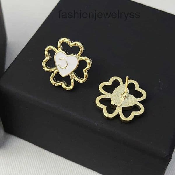 Gold Tone Clover Earrings with White Enamel and Initial Detail Trendy Charming Jewelry for Womens Suitable for Various Occasions