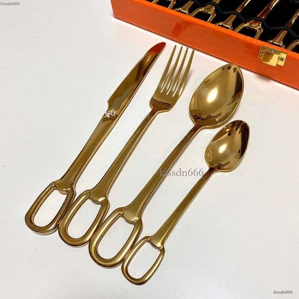 Designer cutlery set with 24 types of knives, forks, and spoons, available in silver and gold, making it a great gift