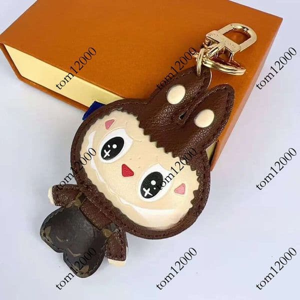 Designer Labubu Joint Leather Metal Doll Cartoon Couple Handmade Keychain Mobile Phone Bag Pendant Gift
