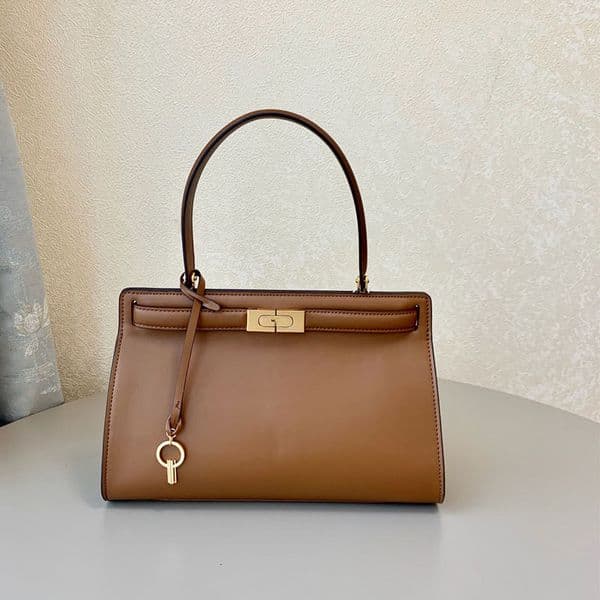 2026 new women s bag new crossbody bag designer handheld magnetic buckle cowhide medium sized commuter handbag