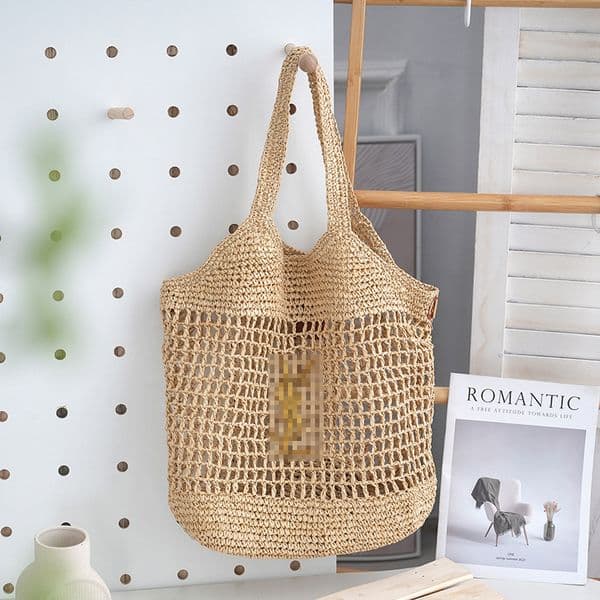 Designer's new large capacity hollow straw multifunctional leisure single shoulder fashionable brand dog and cat bag, fashionable travel shopping bag