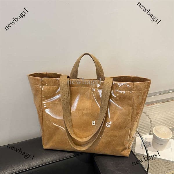 Designer's New Paper Jelly Fashionable Transparent PVC Waterproof Handbag Large Capacity Commuting Handbag Women's Bag