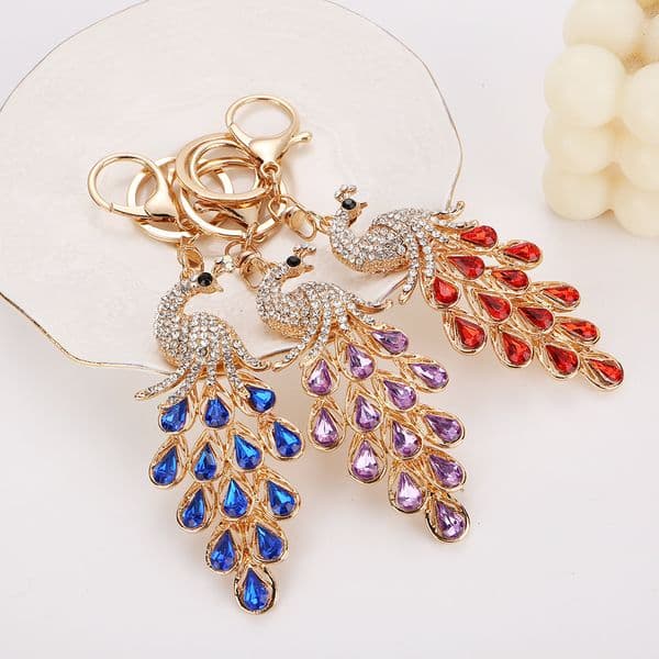 ornament bestseller: diamond-encrusted peacock keychain, colorful rhinestone phoenix-shaped pendant, creative backpack accessory for women