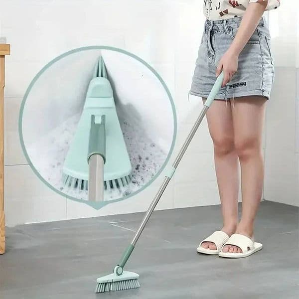 A long handled hard bristled triangular floor brush, bathroom tile gap cleaning brush