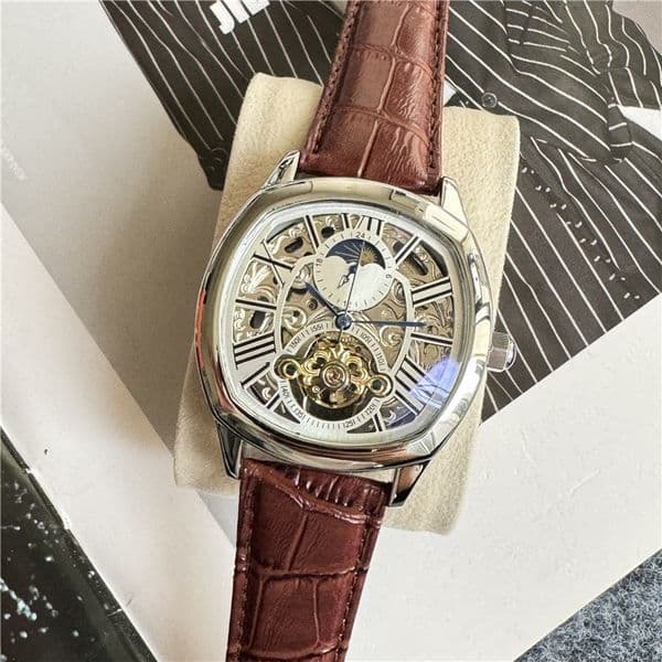 Full automatic hollow mechanical watch men's business watch high matching red leather mirror watch with bow buckle