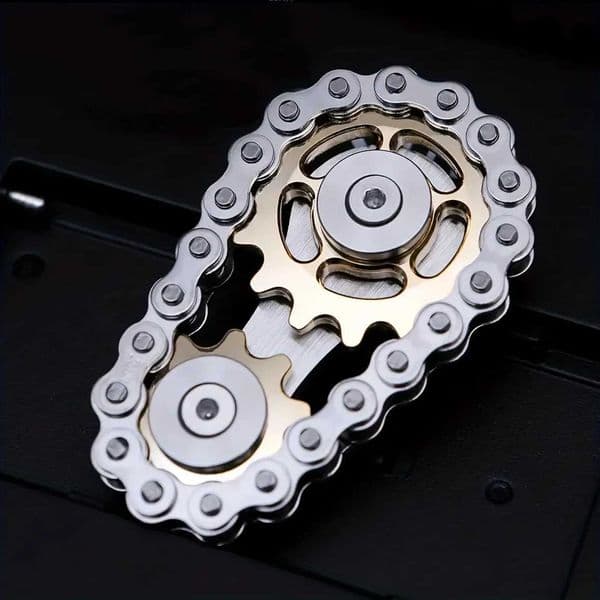 A sprocket rotating metal toy with gear chain teeth flywheel and sprocket swing to relieve pressure on the sprocket W241230