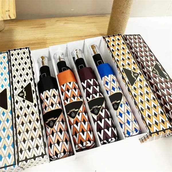 designer folding three fold umbrella, rainproof, fashionable, waterproof, automatic travel sunshade for men and women