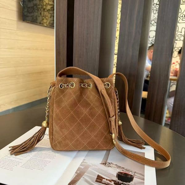 Designer Ladies drawstring bucket bag Matte black tassel drawstring bag exudes a sense of luxury with golden beads Diamond Lattice Genuine Leather Womens Bag