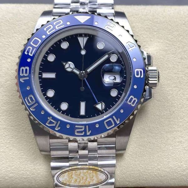 Designer blue and black bezel multi-time zone mechanical watch, automatic timekeeping, stainless steel strap, men's watch