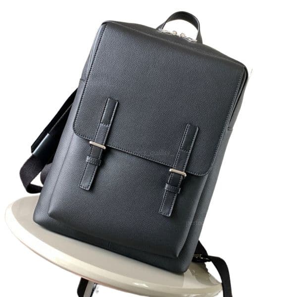 The 99A designer has created a soft-grain cowhide military backpack with a dual shoulder strap. The inner compartment can accommodate a laptop and is perfect for travel.