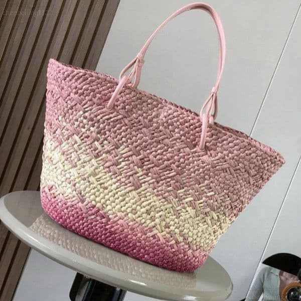 99A exclusive design for top designers. Leather and straw woven crossbody bag. High-grade pure steel hardware adds an elegant touch. Must-have for summer outfits.