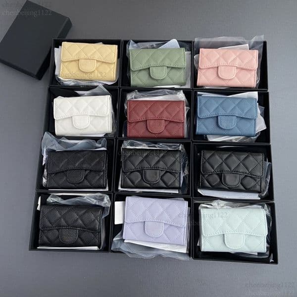 99A Who could possibly refuse the 12A quality designer card wallet? It's made of 100% genuine leather, compact and portable, with an extremely fashionable design.