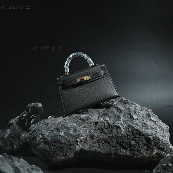 This second-generation 99A portable single-shoulder crossbody casual mini bag, featuring the concepts of top designers and imported TOGO leather, elevates your style.