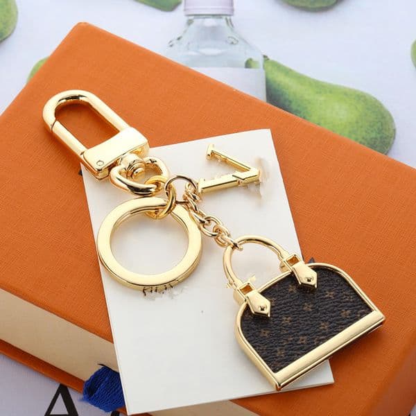 Designer Charms Luxury Mini Bag Pendant New Stainless Steel Clover Keychain Leather Wallet Keychains Car Purse Accessory Christmas Gift With Box