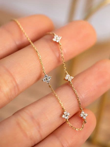designer madam flowing light s925 plated 18k gold fourleaf clover star bracelet simple zircon pure silver womens commuting ship within 24 hours