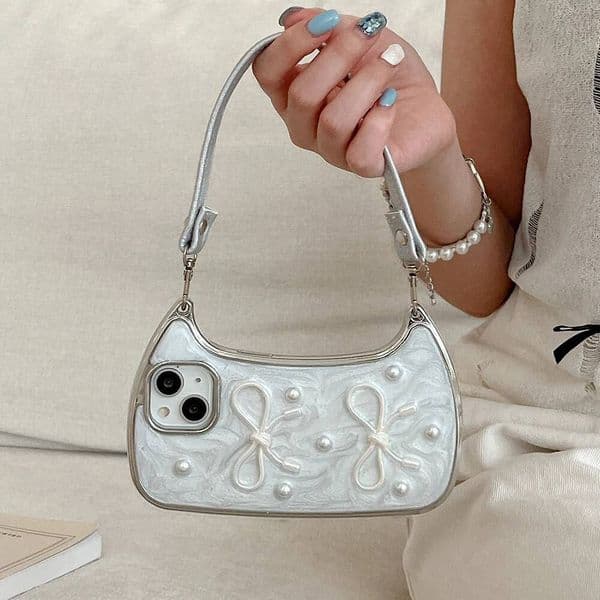3D Bow Pearl Handbag Hand Strap Phone Case For iPhone 17 Air 16 15 14 13 12 11 Pro Max Soft Shockproof Cover