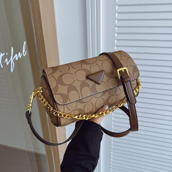 Luxurious Designer Mini Cylinder Handbag with Adjustable Chain Strap for Casual Elegance