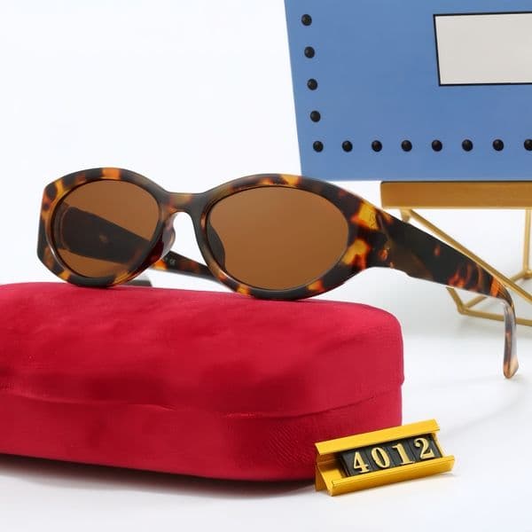 Sunglasses new fashion glasses luxury designer sunshade glasses letter outdoor leisure beach mirrors uv and radiation resistant sunglasses with box 4012