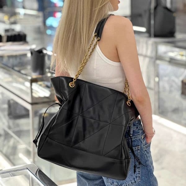 designer leather shoulder armpit hand-held garbage tote bag, large capacity commuting crossbody chain bag