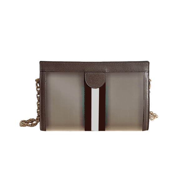 Elegant compact designer shoulder bag; mixed materials; denim and leather cross-body carry bag.