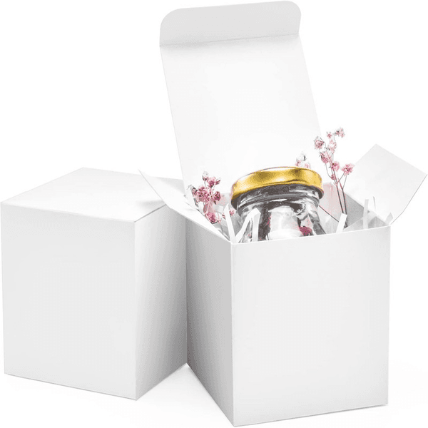 50 white gift boxes each in a cube shape with a lid They are suitable for gifts handcrafts and cupcake packaging and easy to assemble for party favors
