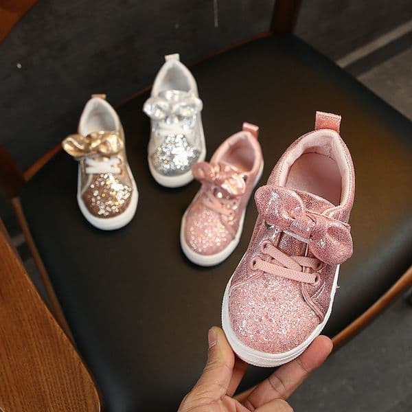 Casual children's board shoes with shiny bow rubber thin sole anti slip and durable fashionable men's and women's travel shoes designer shoes