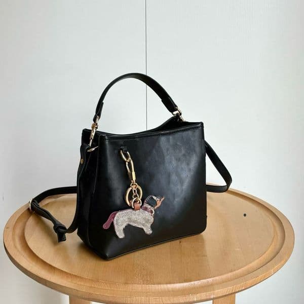 Luxury fashion designer handbag, women's simple and fashionable leather shoulder strap cross-body bag, luxury classic one-shoulder bucket handbag.